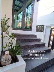 Double doors entrance to entertainment area