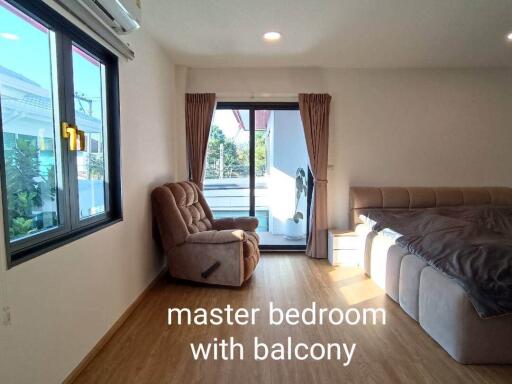 Master bedroom with balcony