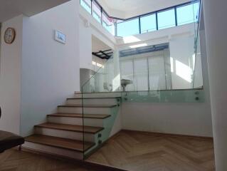 Modern staircase with glass railing