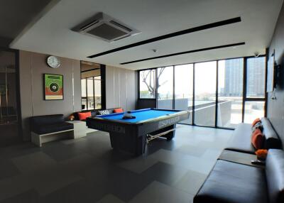 Modern entertainment room with a pool table