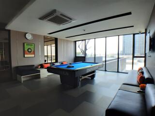 Modern entertainment room with a pool table