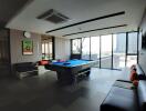 Modern entertainment room with a pool table