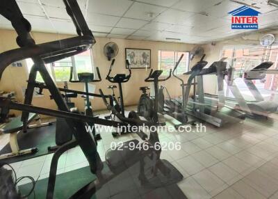 Well-equipped fitness room with exercise machines