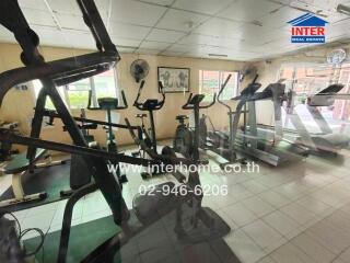 Well-equipped fitness room with exercise machines