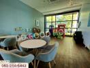 Children's playroom with tables and chairs