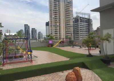 Rooftop playground with city view