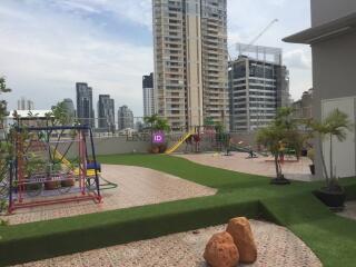 Rooftop playground with city view