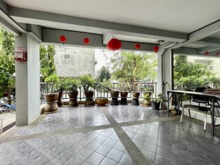 Outdoor patio area with potted plants