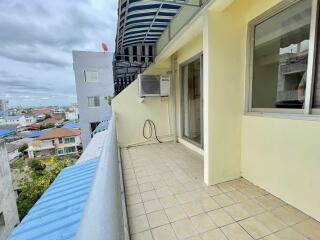 Spacious balcony with a city view