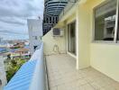 Spacious balcony with a city view