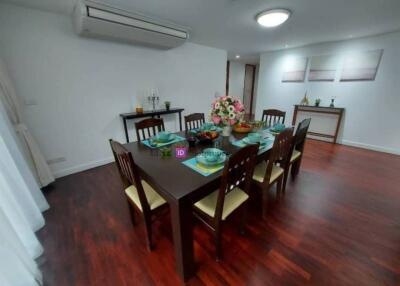 Dining room with wooden table and chairs