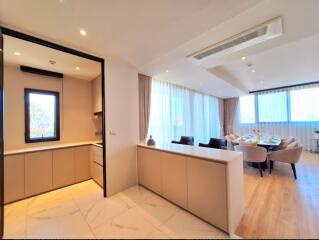 Modern kitchen and dining area with natural light