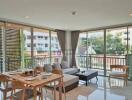 Modern living room with large windows and balcony