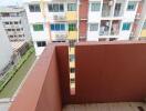 View from balcony overlooking buildings and canal