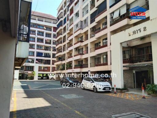 Exterior view of residential building with multiple floors