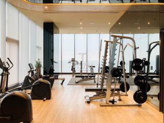 spacious gym with modern exercise equipment