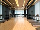 Well-equipped indoor gym with treadmills and modern lighting