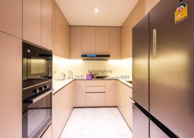 Modern kitchen with built-in appliances and ample storage