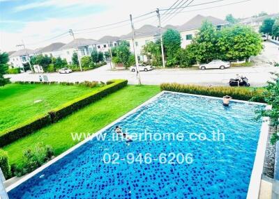 Private swimming pool overlooking residential area