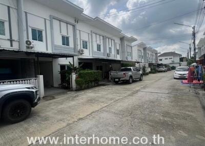 View of a residential street with townhouses