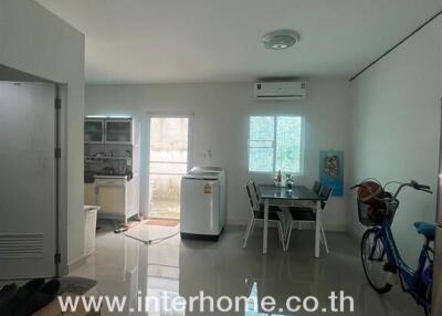 Modern kitchen area with dining space