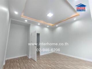 modern room with recessed lighting and wooden floor