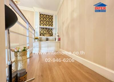 Stylish hallway with wooden floors and decorative elements