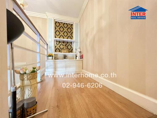 Stylish hallway with wooden floors and decorative elements