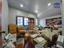 Cluttered bedroom with boxes