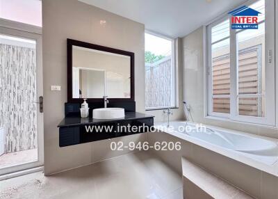 Bathroom with modern fixtures and natural light