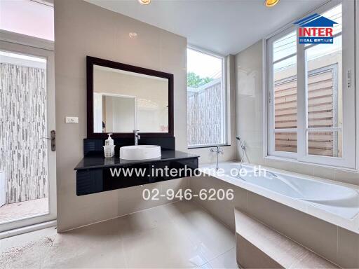 Bathroom with modern fixtures and natural light