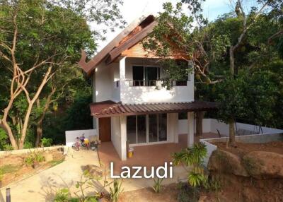 3.75 Rai Land with Spacious 3-Story Villa and Additional 3-Story House, Walking Distance to Yanui Beach