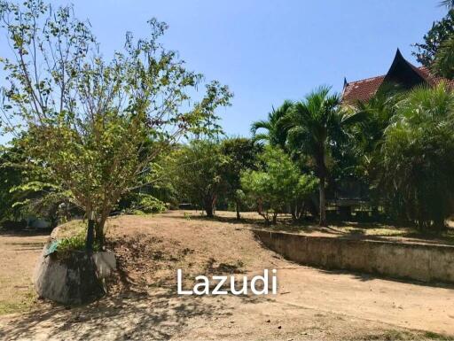 3.75 Rai Land with Spacious 3-Story Villa and Additional 3-Story House, Walking Distance to Yanui Beach