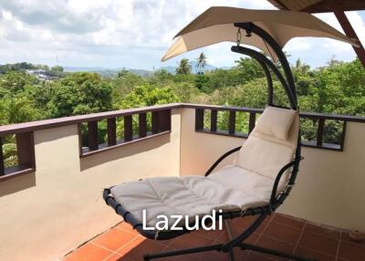 3.75 Rai Land with Spacious 3-Story Villa and Additional 3-Story House, Walking Distance to Yanui Beach