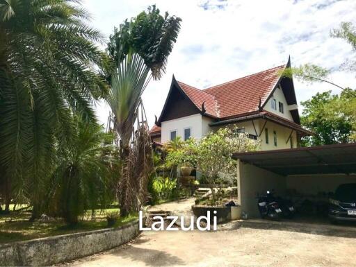 3.75 Rai Land with Spacious 3-Story Villa and Additional 3-Story House, Walking Distance to Yanui Beach