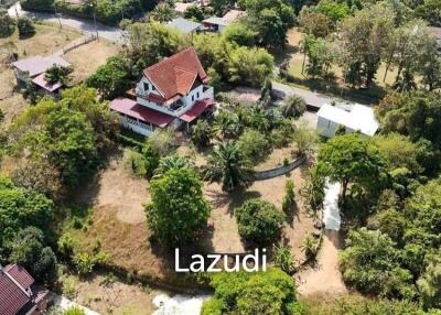 3.75 Rai Land with Spacious 3-Story Villa and Additional 3-Story House, Walking Distance to Yanui Beach