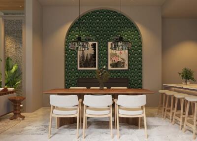 Stylish dining area with a modern green accent wall, wooden table, and white chairs.