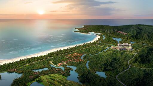 Aerial view of a coastal area with resorts, beach, and lush greenery