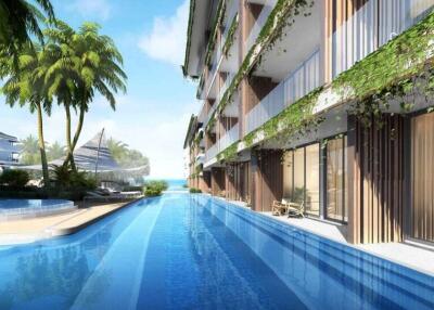 Luxury resort pool area with adjacent balconies and lush greenery