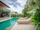 Modern house with swimming pool and outdoor seating