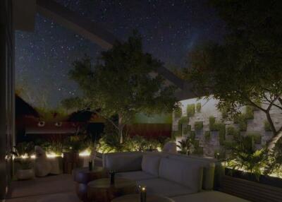 Cozy outdoor lounge area with seating under the night sky