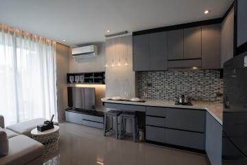 Modern living and kitchen area with contemporary design and decor