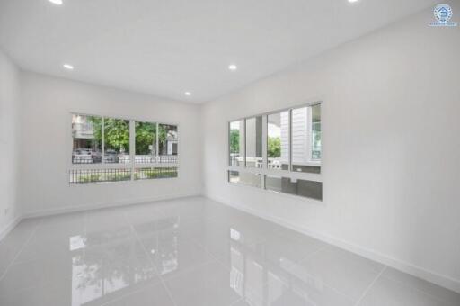 Bright and spacious living area with large windows