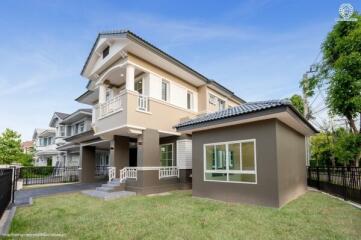 Modern two-story house with a well-maintained yard