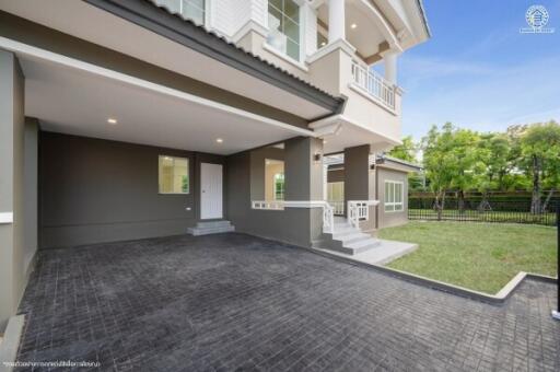 Modern house exterior with front yard