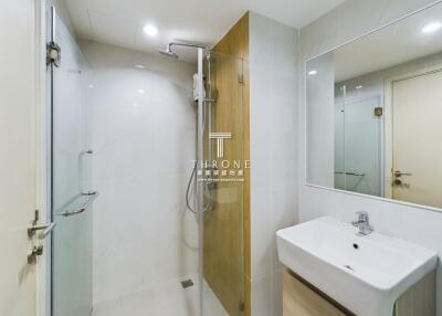 Modern bathroom with glass shower and sink