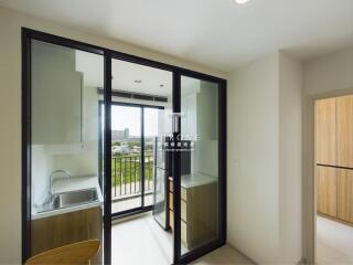 Modern kitchen with balcony view