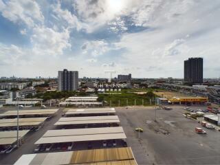 View from property overlooking parking area and city buildings