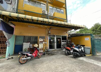 Exterior view of building with motorcycles parked outside