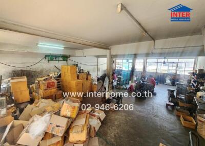 Warehouse with scattered boxes and various items